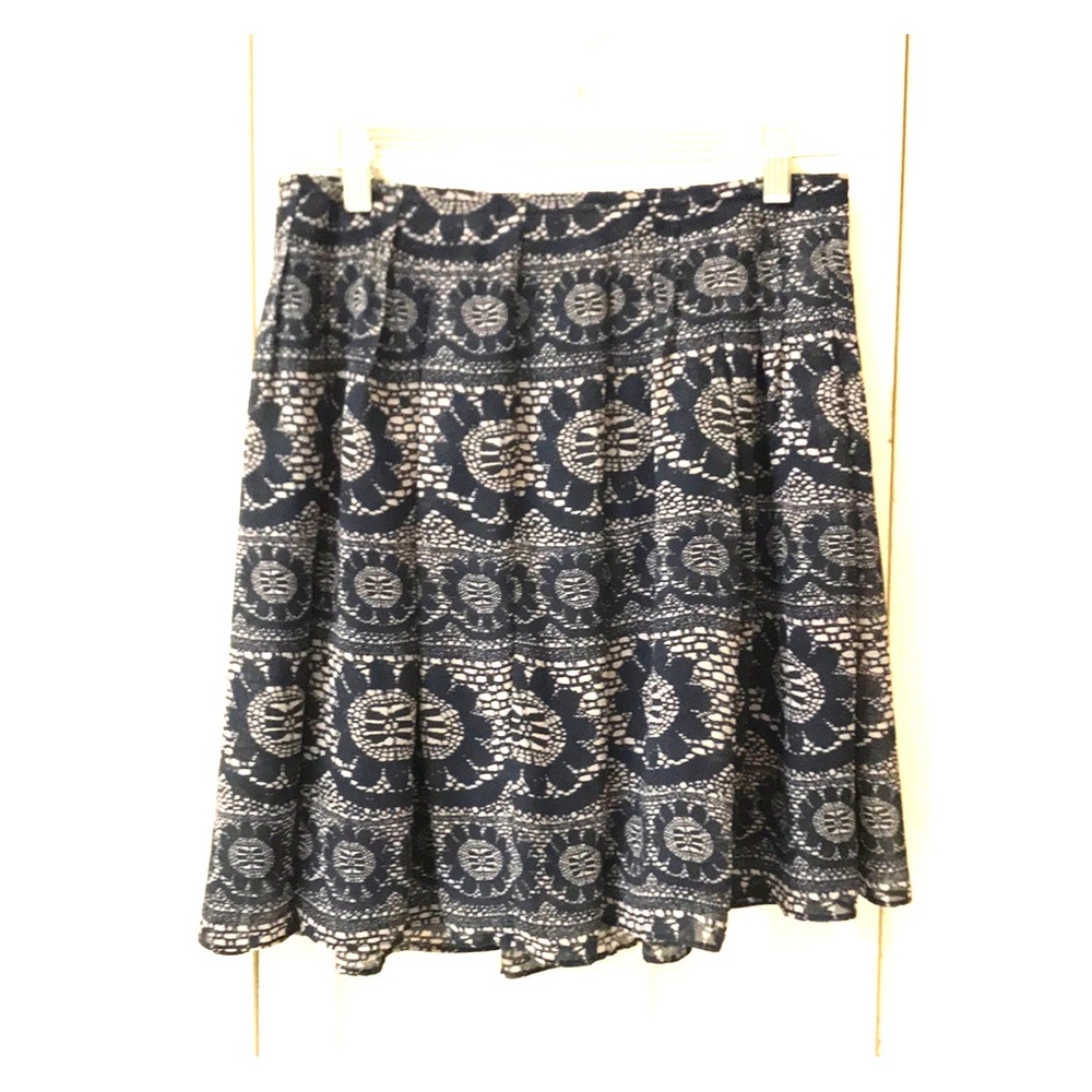 Short to mid length floral flared skirt